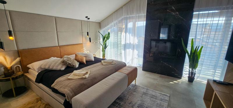 Izba Apartmanica Chalet 5A Donovaly v CTS - CONSULTING TRADE SERVICE s.r.o. – spálňa