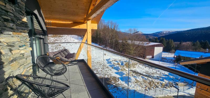 Izba Apartmanica Chalet 5B, Donovaly v CTS - CONSULTING TRADE SERVICE s.r.o. – Posedenie na balkone